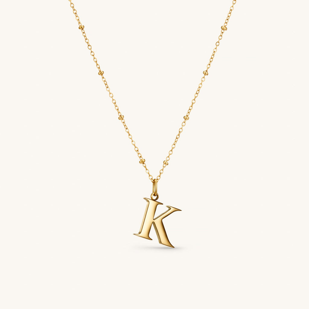 Collier pendentif initiale K en Or