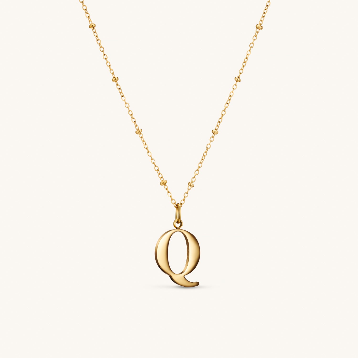 Collier pendentif initiale Q en Or