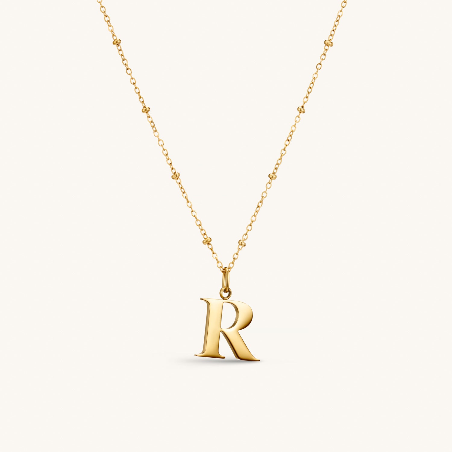 Collier pendentif initiale R en Or