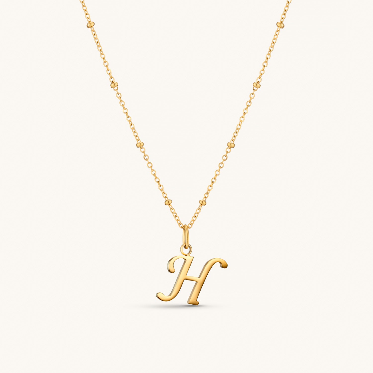 Collier Initiale H en Écriture Script en Or