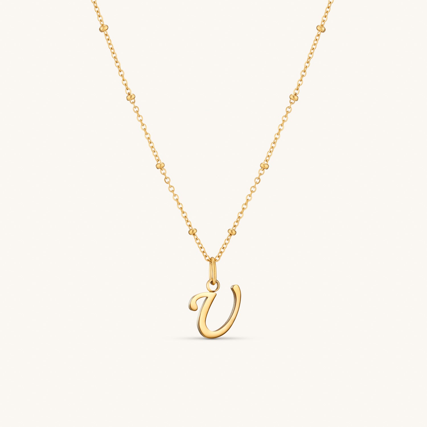 Collier Initiale U en Écriture Script en Or
