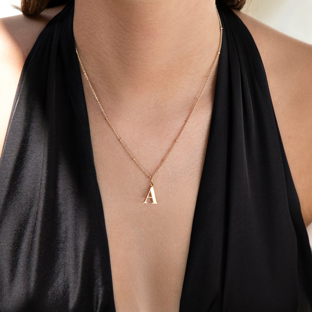 Collier pendentif initiale J en Or