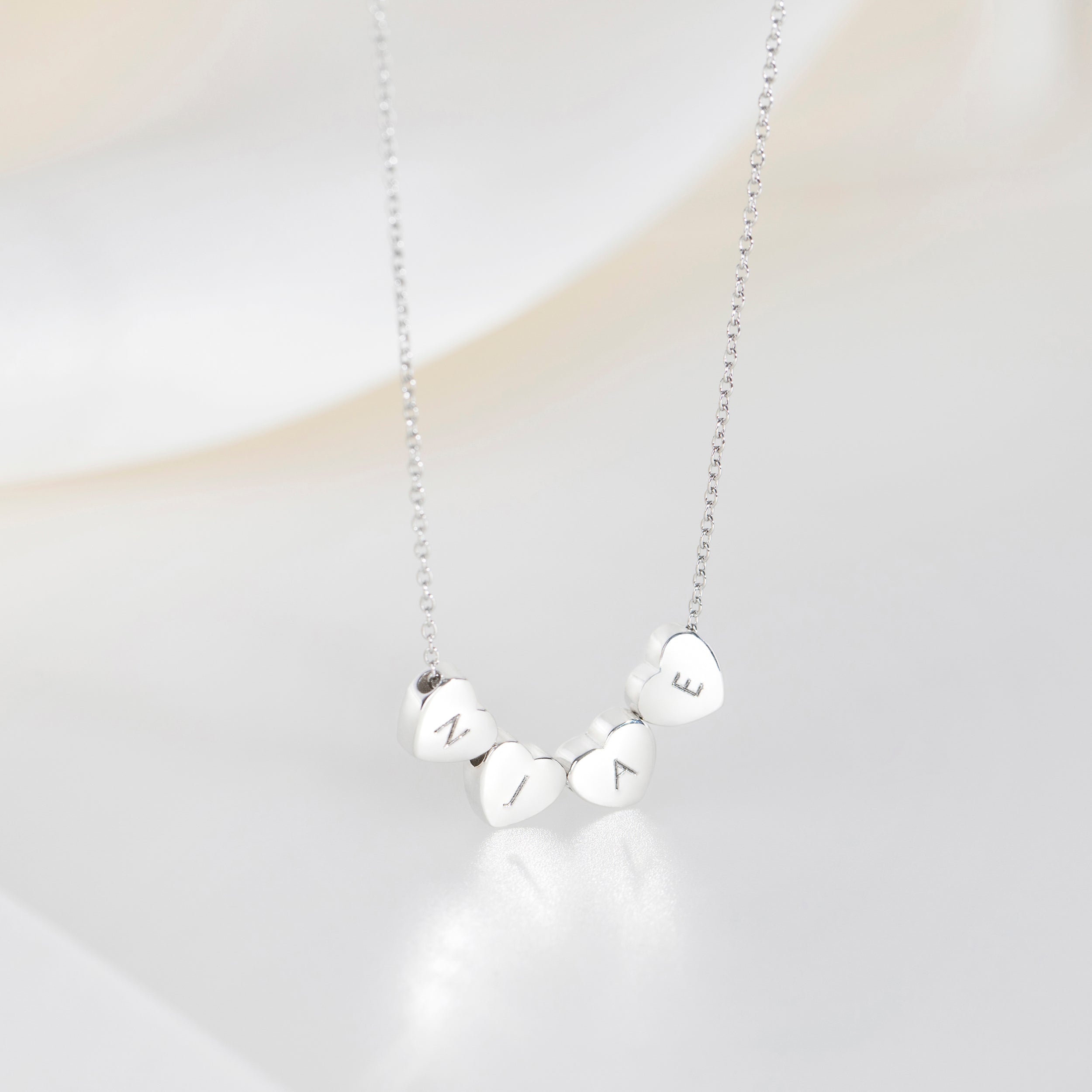 Collier Cœur Amo à Quadruple Perle en Argent
