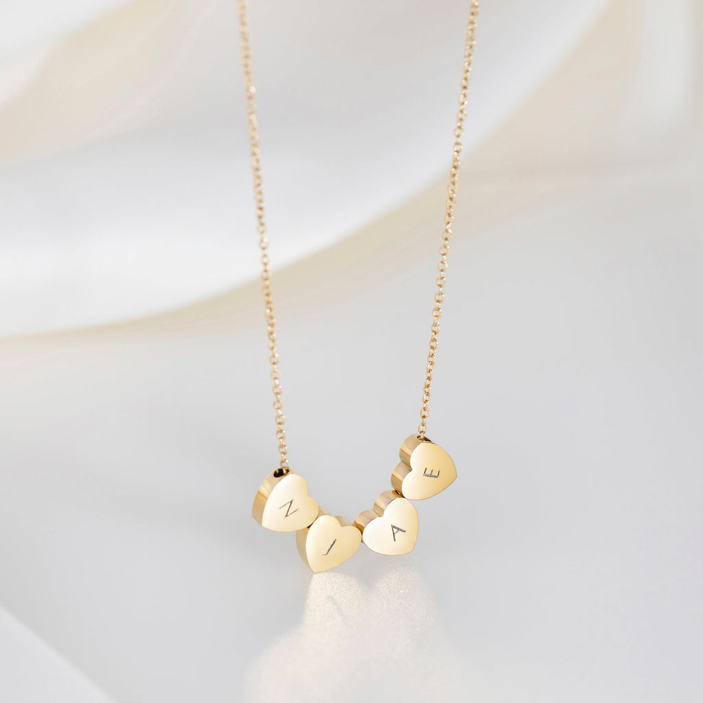 Collier Cœur Amo à Quadruple Perle en Or