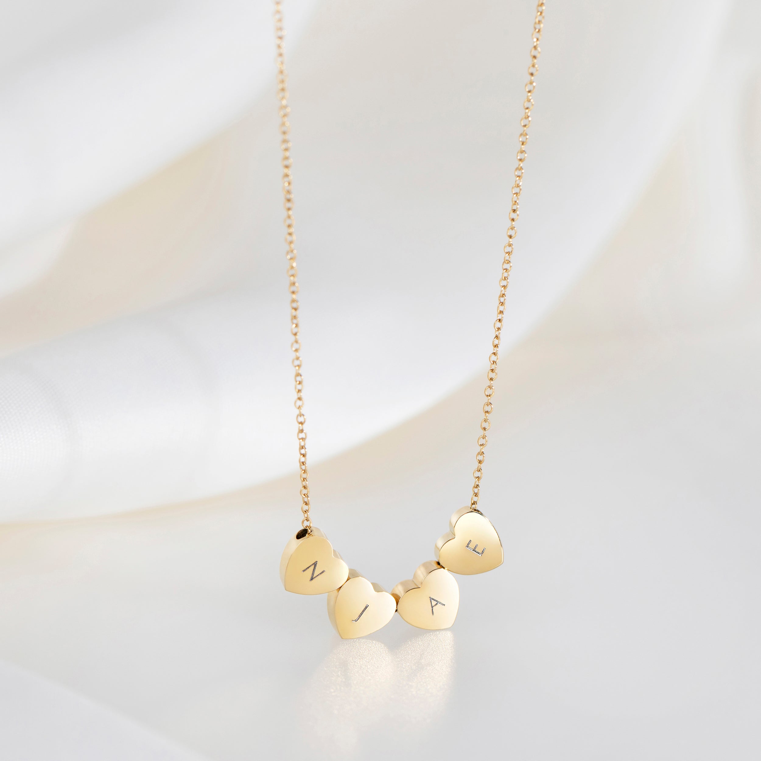 Collier Cœur Amo à Quadruple Perle en Or